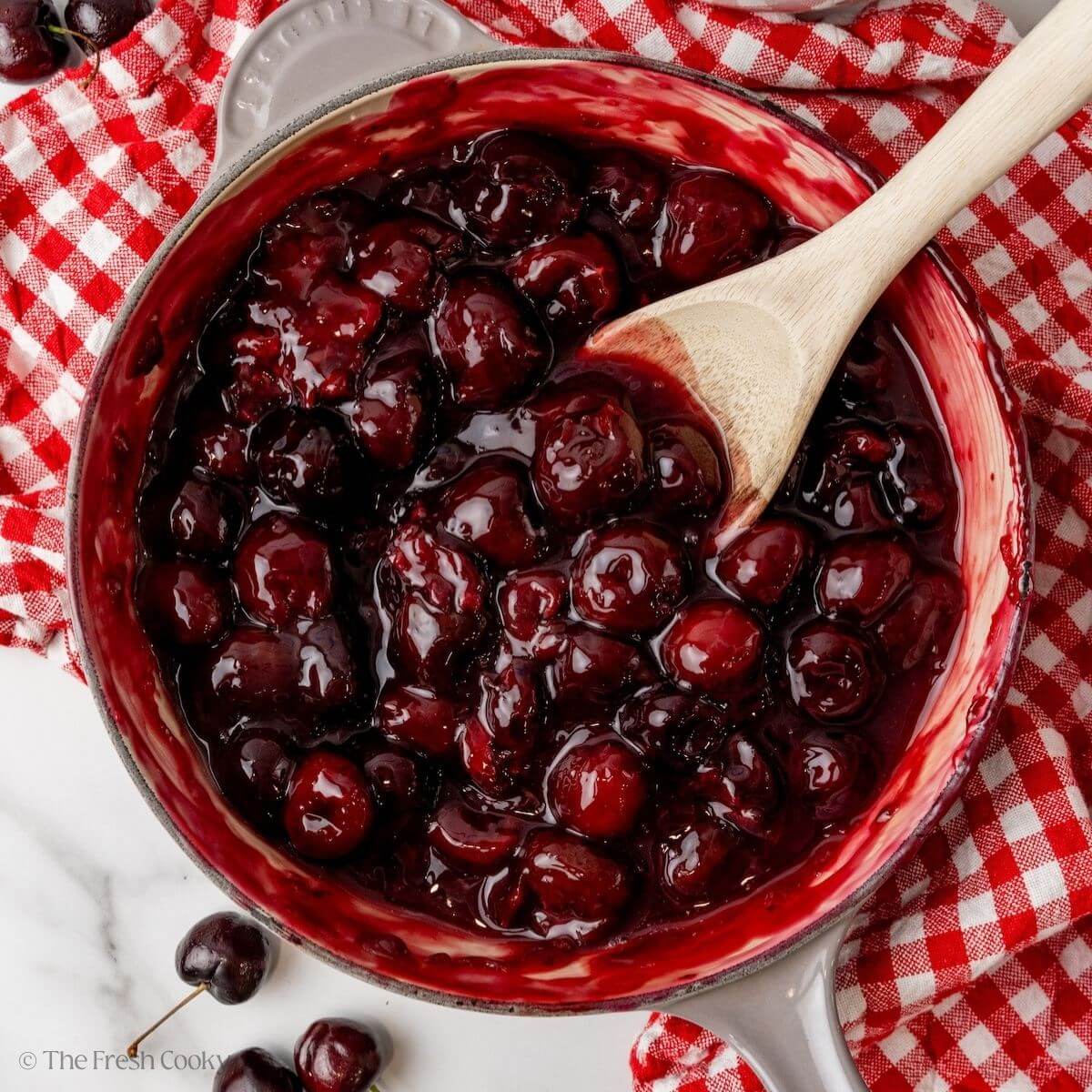 Overhead shot of cherry pie filling in a skillet.
