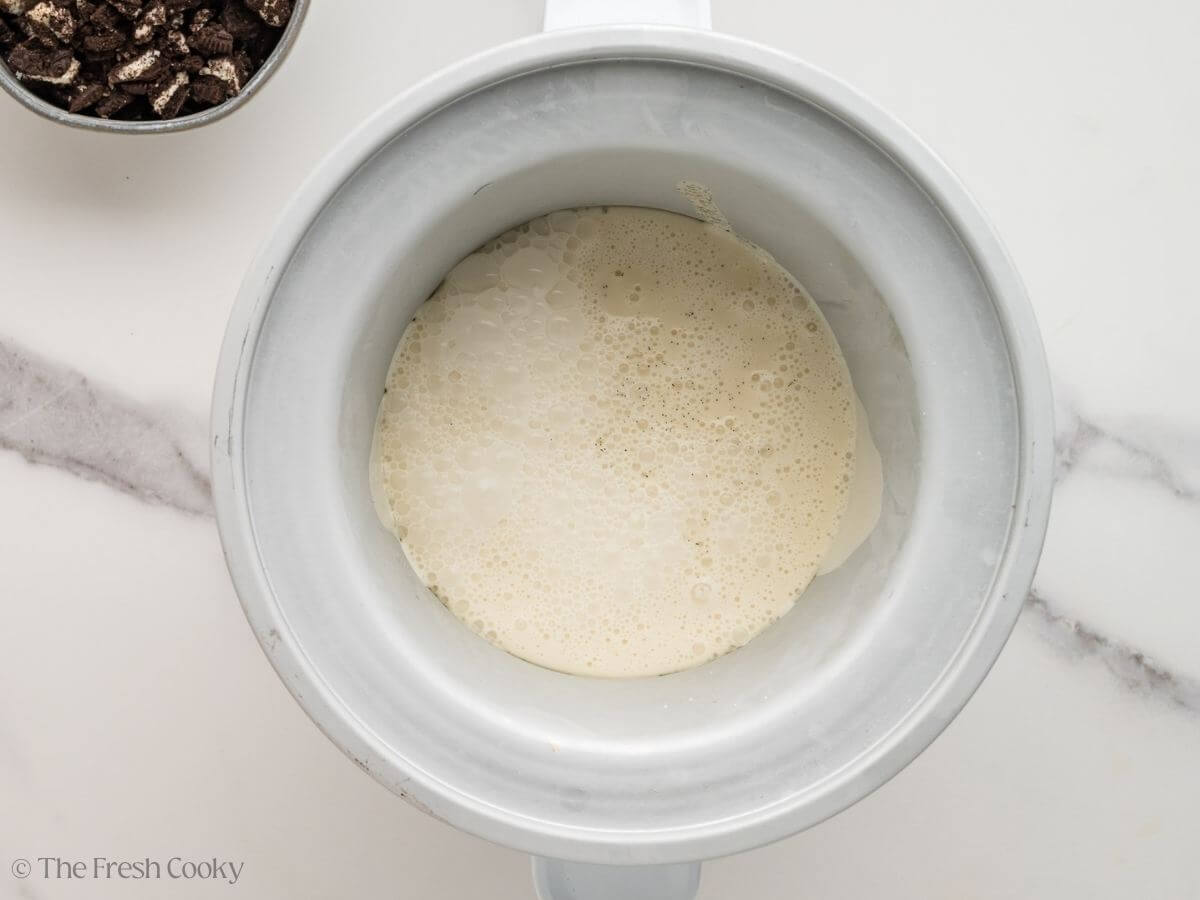 Cream and sugar mixture added to the ice cream maker.