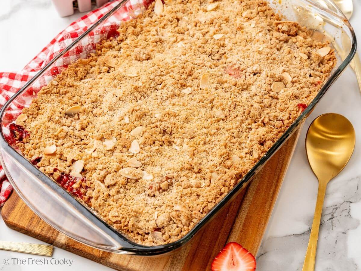 Strawberry rhubarb crisp in a glass baking dish after baking.