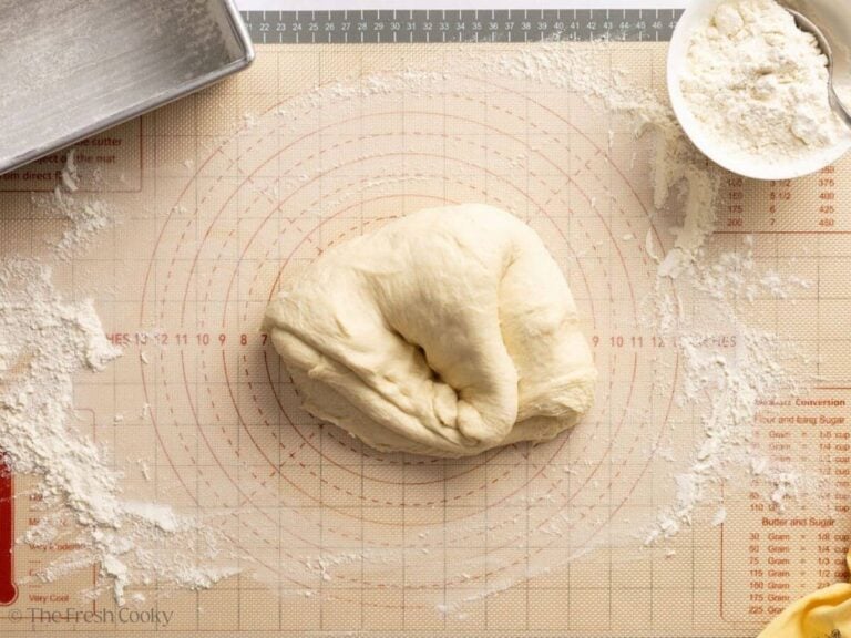 Sandwich dough placed on a floured surface to shape.