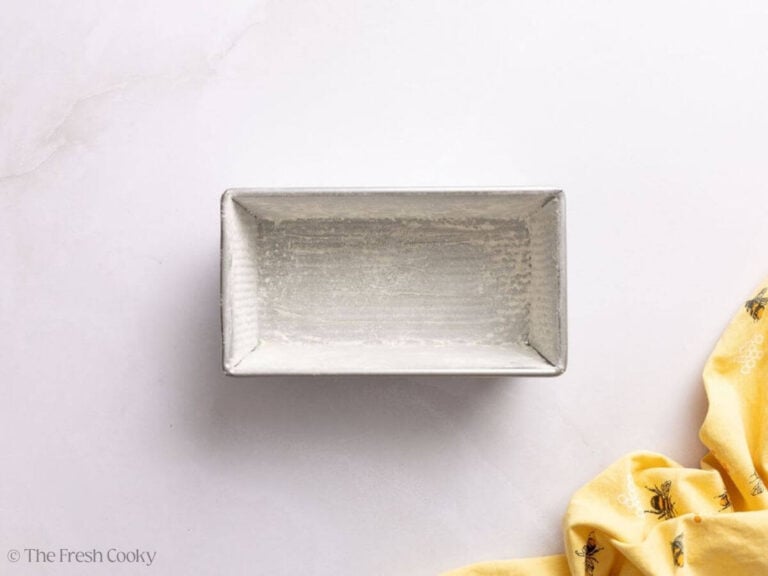 Overhead shot of floured loaf pan.