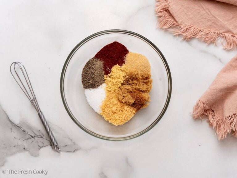 Ingredients for burger seasoning in a small bowl before mixing together.