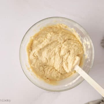Eggs and vanilla added to the butter and half of the dry ingredients folded in.