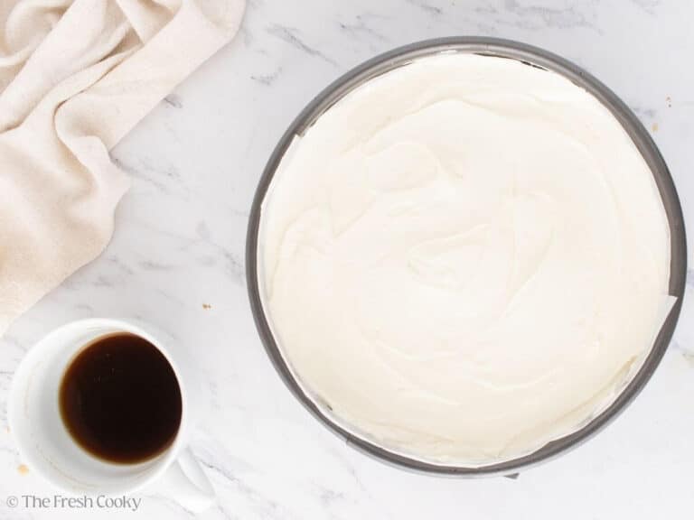 Another layer of cream cheese filling on top of the ladyfingers.