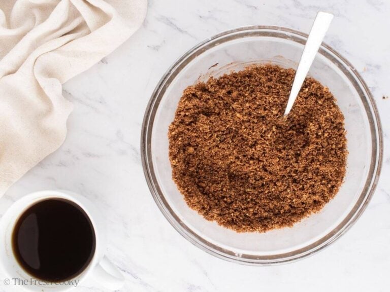 Graham cracker crust in a mixing bowl after being mixed.