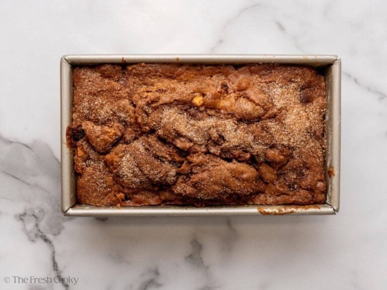 Apple cinnamon bread in a loaf pan after baking.