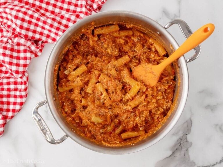 Mixed pasta mixture with meat sauce and cheeses.