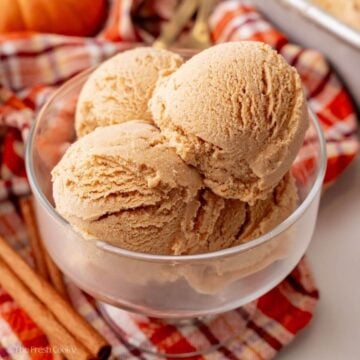 Three scoops of creamy pumpkin pie ice cream.