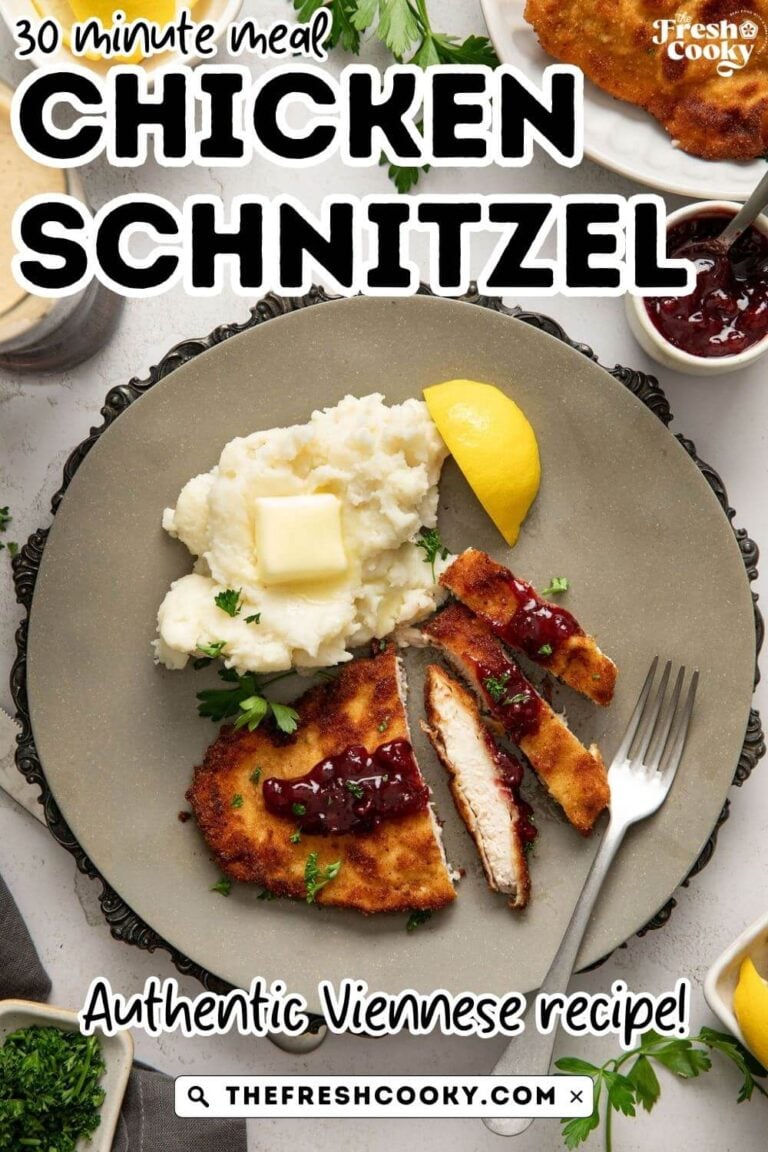 Sliced chicken schnitzel on a plate with mashed potatoes, to pin.