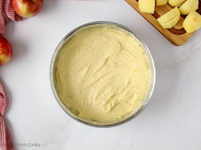 Cake batter added to the prepared cake pan.