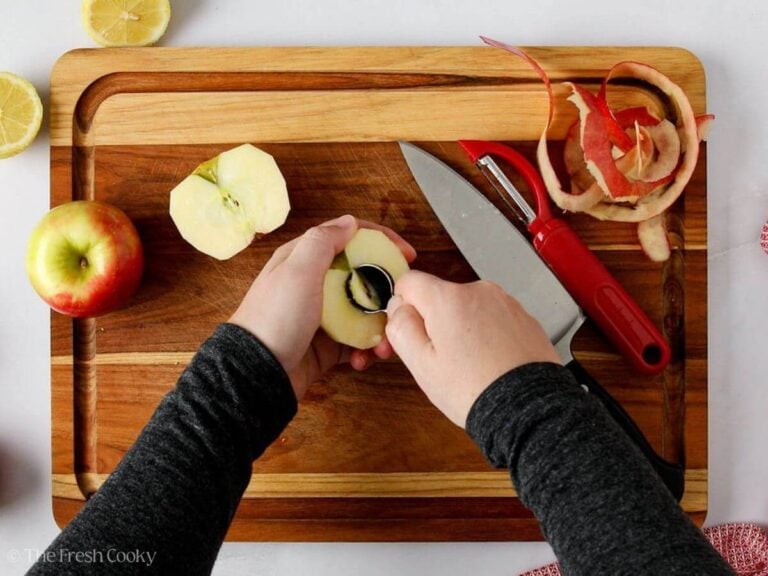 Coring the apples before slicing them.