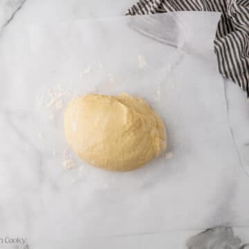 Punch down dough and smooth.
