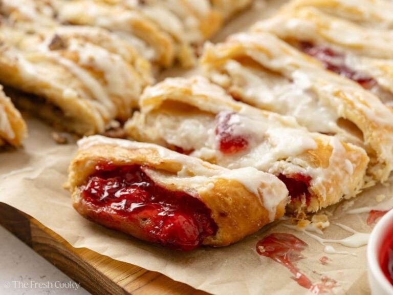 Cherry filled Danish kringle pastry cut in slices.