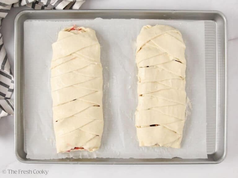 Two Danish kringles brushed with an egg white wash.