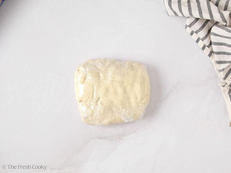 Kringle dough wrapped in plastic wrap.