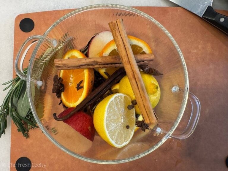 Ingredient for the fall simmer pot paced in the glass pot.