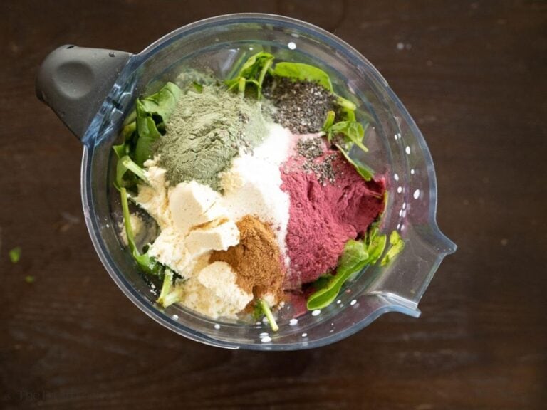 Powders like protein powder, beet root powder, and some spices added to the fruit and vegetable smoothie in a blender.