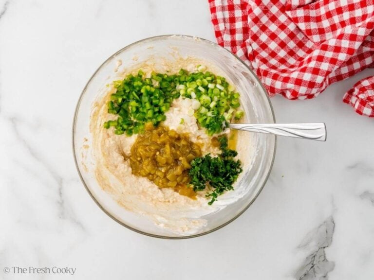 Chiles, jalapenos, cilantro and green onions added to the cream cheese base of the dip.