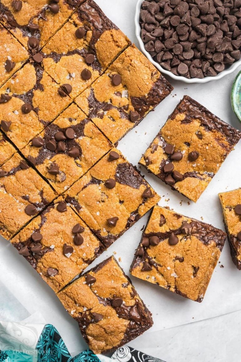 Overhead image of cut brookies with a bowl of chocolate chips.