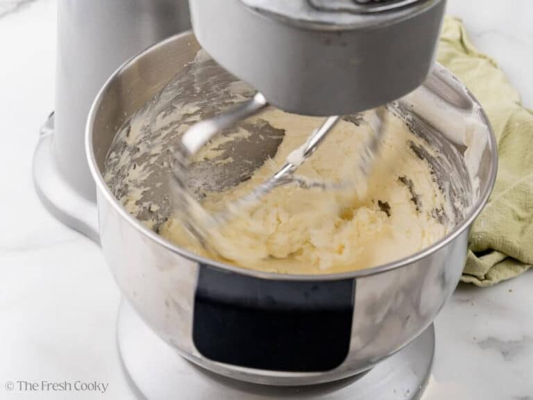 Cream cheese mixture combined in the bowl of a stand mixer.
