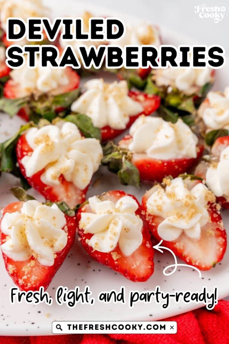 A bunch of pretty halved strawberries topped with a cheesecake kiss for pinning.
