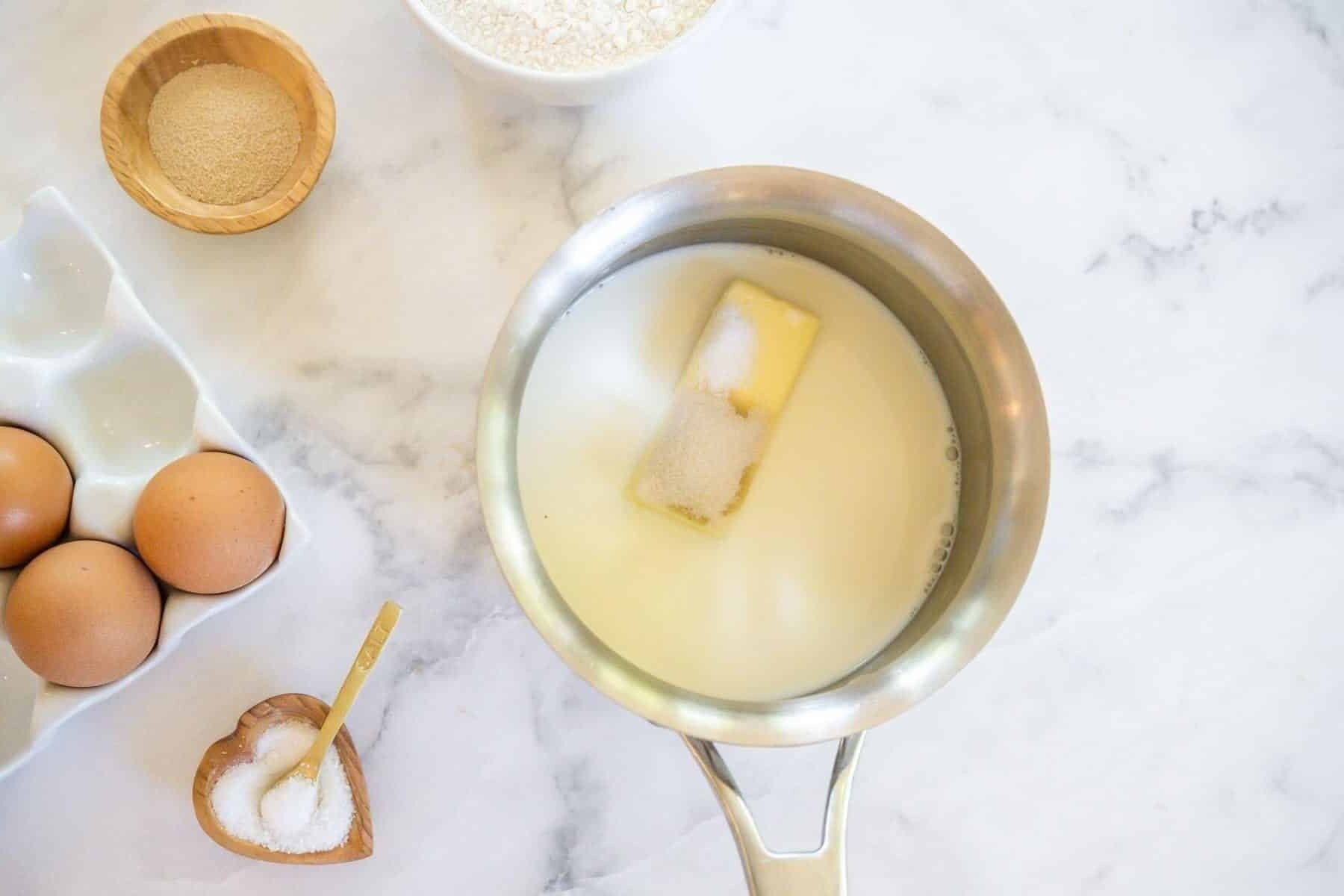Butter milk and sugar in small saucepan.
