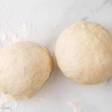 Two balls of pizza dough.