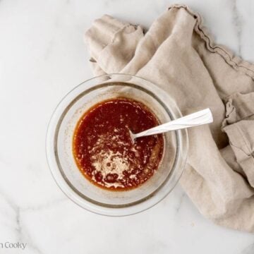 Glaze for carrots mixed together in a small bowl.
