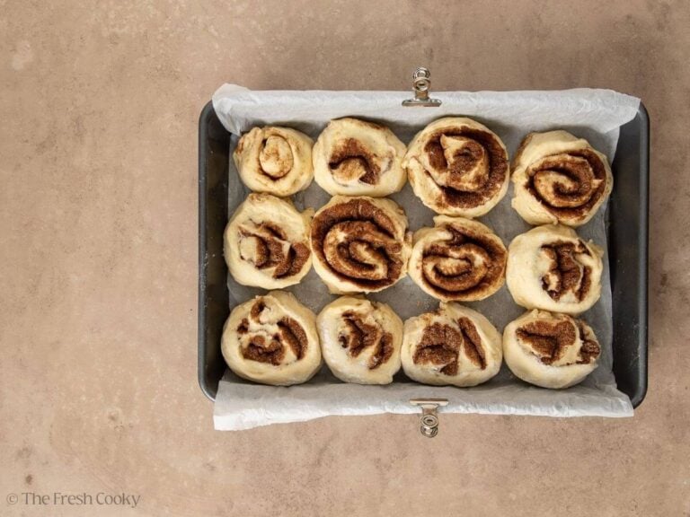 Cinnamon rolls in baking pan, before rising.