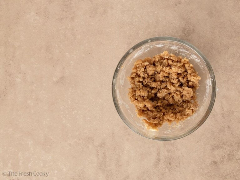 Crumbly streusel topping in a glass bowl.
