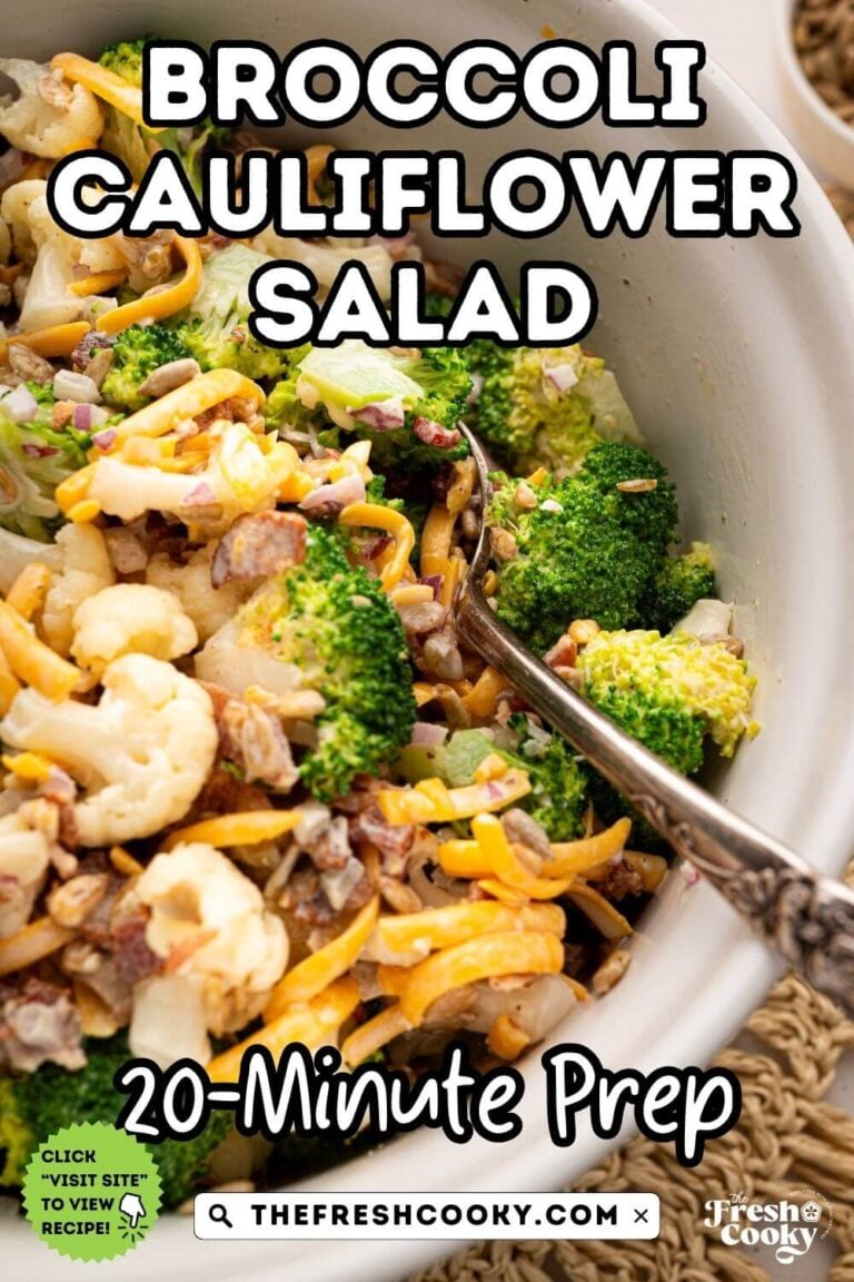 Close up of a bowl of broccoli cauliflower salad with shredded cheese and bacon, to pin.