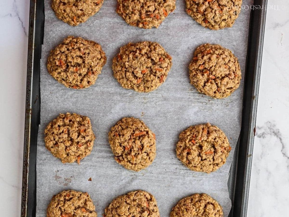 Carrot cake oat cookies baked on sheet pan.