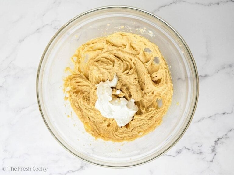 Yogurt on top of creamed butter and sugar.