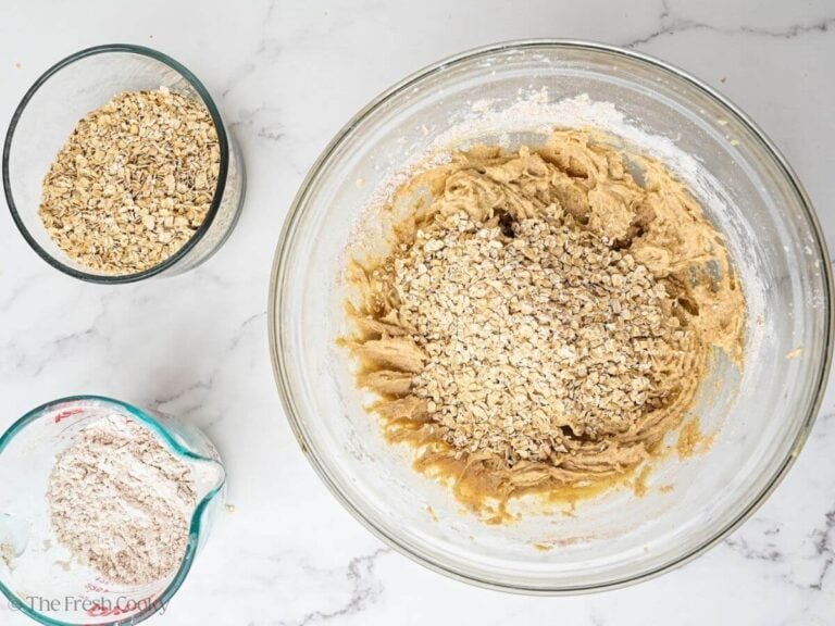 Roll oats on top of cookie batter.