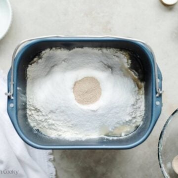 All ingredients layered in order in bread machine container.