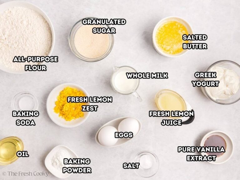 Ingredients for lemon meringue cupcakes: L-R: all-purpose flour, baking soda, oil, granulated sugar, lemon zest, baking powder, whole milk, eggs, salt, salted butter, lemon juice, yogurt, and vanilla.