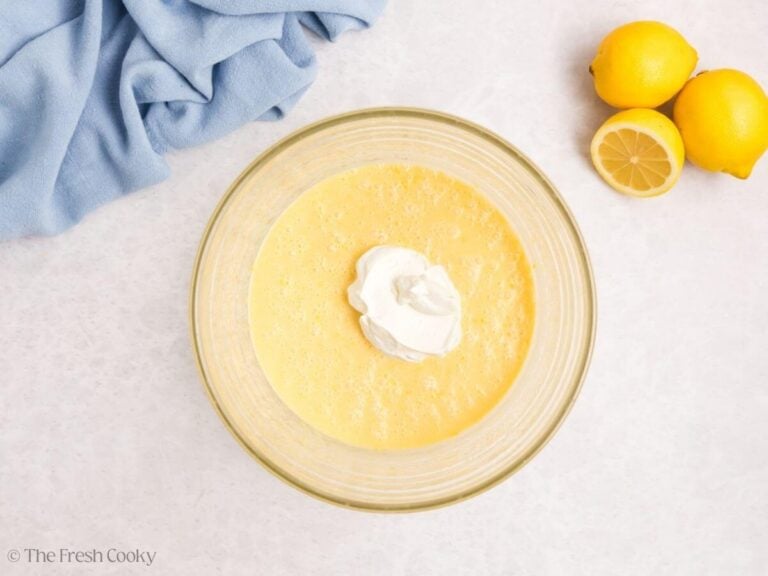 Yogurt added to lemon meringue cupcake batter.