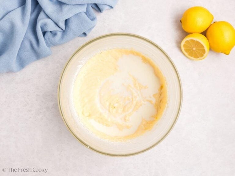Lemon meringue cupcake batter with warm milk added.