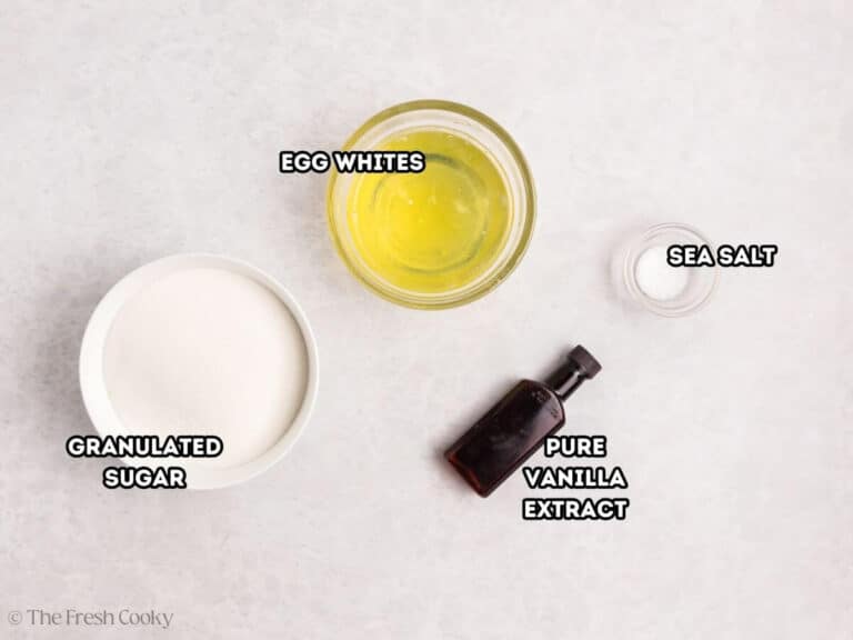 Ingredients for lemon meringue cupcakes meringue topping. L-R: granulated sugar, egg whites, vanilla extract, and sea salt.