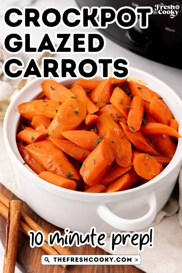 Slow cooker glazed carrots in a pretty white serving dish, for pinning.