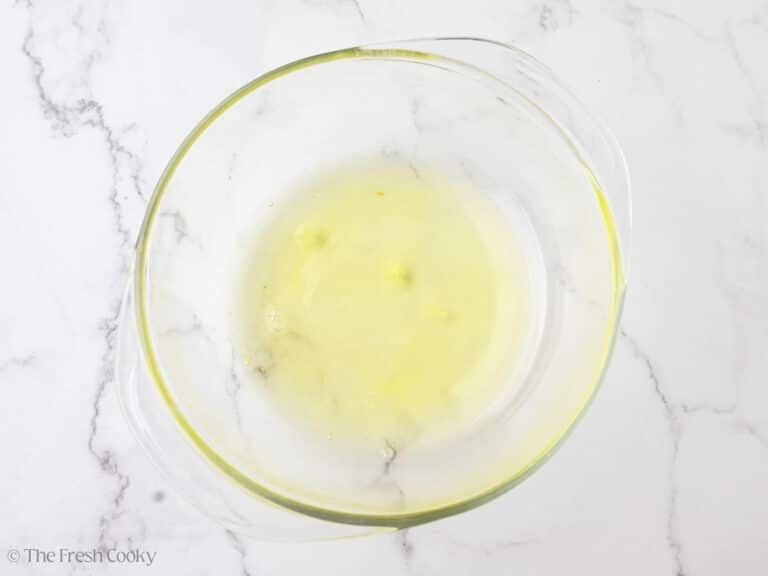 A glass bowl with egg whites.
