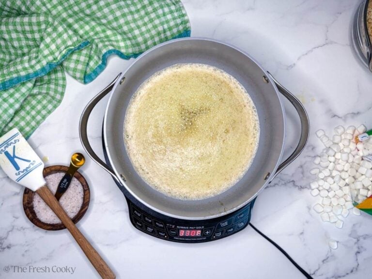 Butter foaming up in pan.