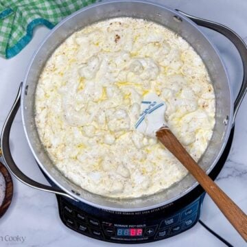 Stir until marshmallows are melted into the butter mixture.