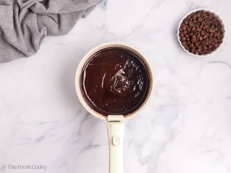 A saucepan with melted chocolate.