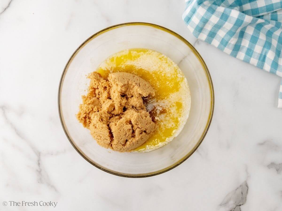 Melted utter and light brown sugar in a mixing bowl.