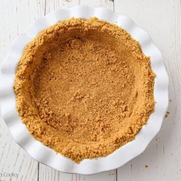 Press evenly on bottom and up edges of pie plate with graham cracker crust.