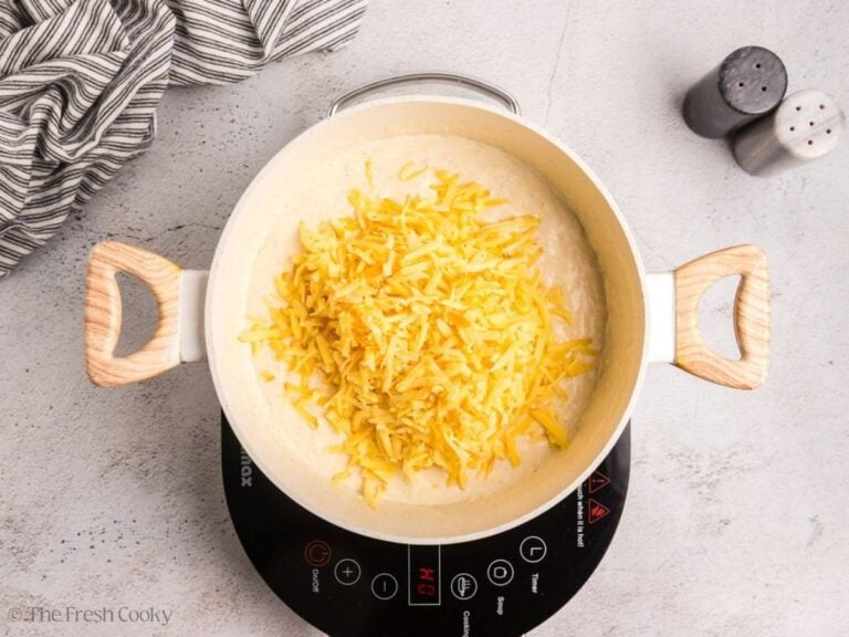 Sharp cheddar added to cream mixture.