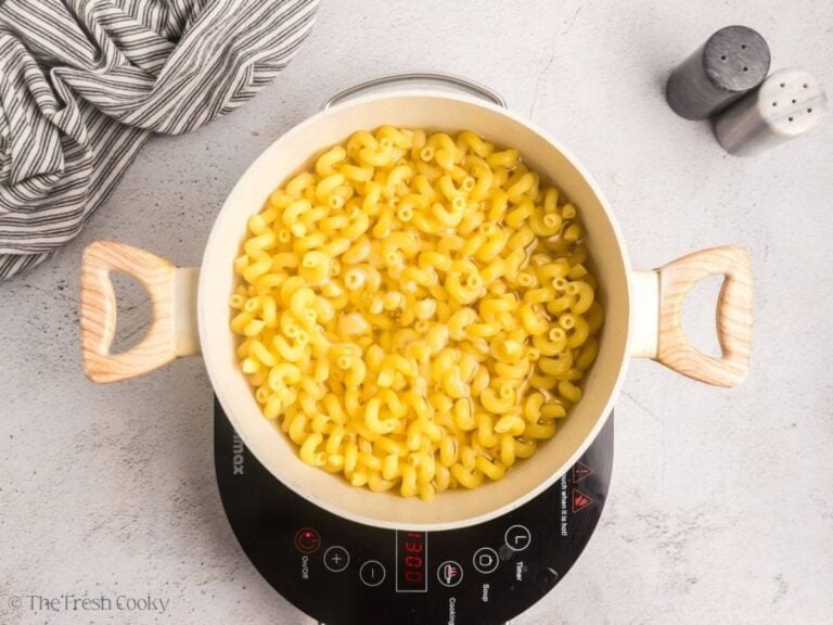 Cooked cavatappi pasta in a large pot.