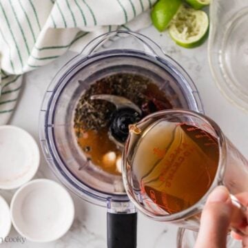 Add beef broth to blender.