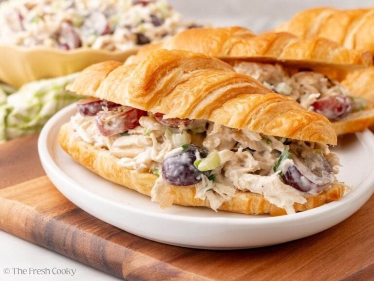 Chicken salad with grapes on croissants.